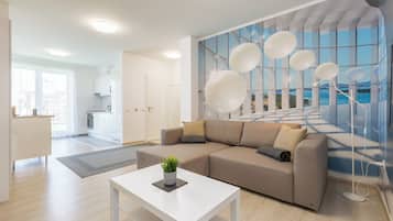 Premium Penthouse, Courtyard View | Living area | Flat-screen TV