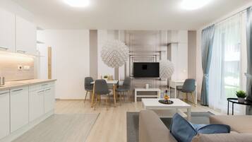 Apartment, 1 Bedroom, Courtyard View | Living area | Flat-screen TV