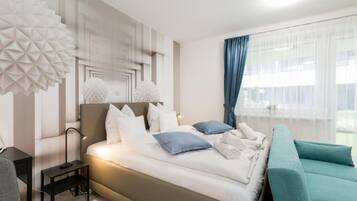 Desk, laptop workspace, blackout drapes, soundproofing