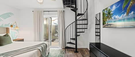 Tabla de planchar con plancha, wifi gratis y ropa de cama