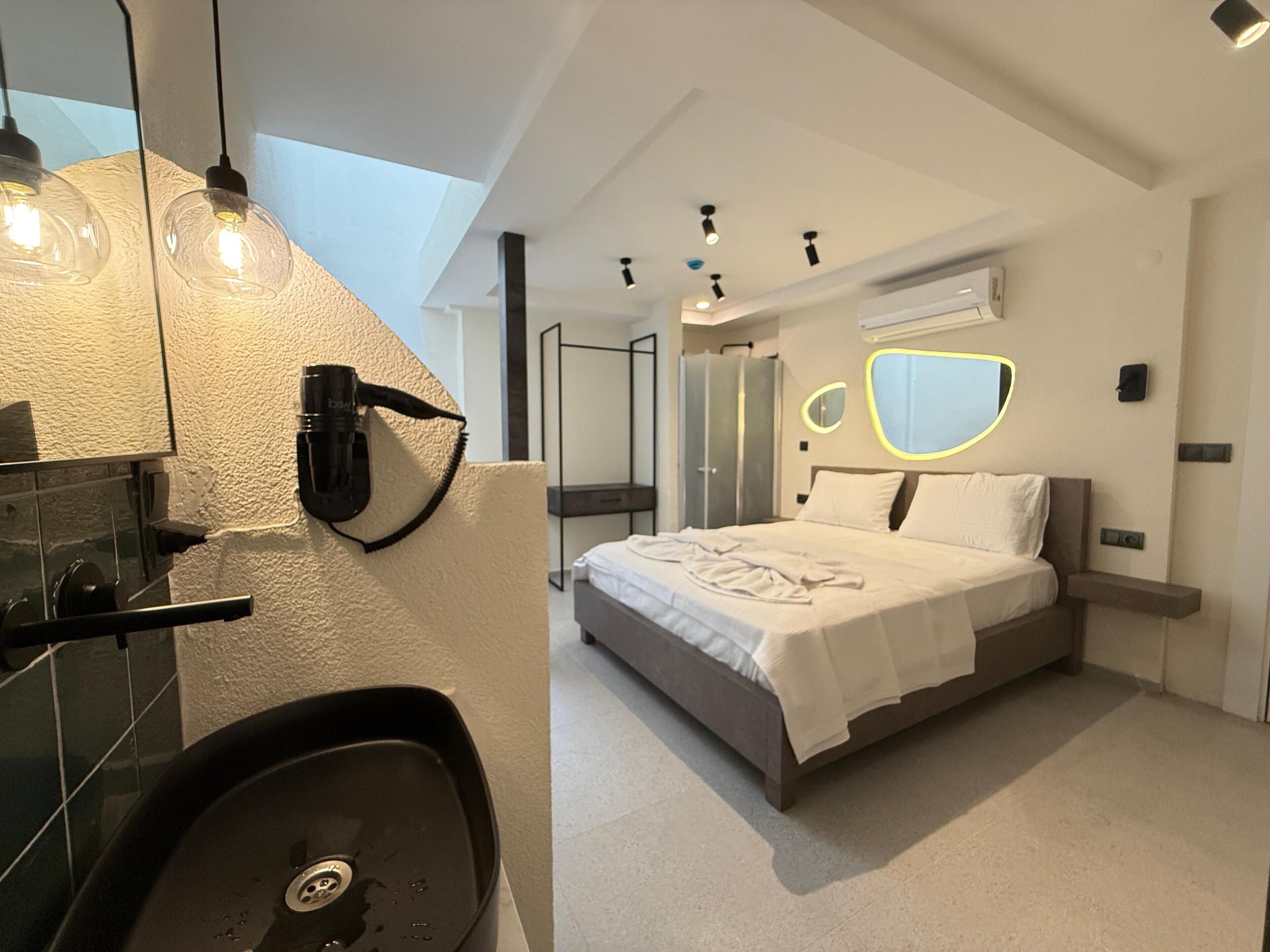 Quarto casal, banheiro privativo | Espaço de trabalho para notebook, Wi-Fi de cortesia