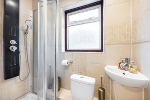 Shower, hair dryer, towels, soap