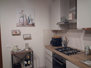 Réfrigérateur, four, plaque de cuisson, lave-vaisselle