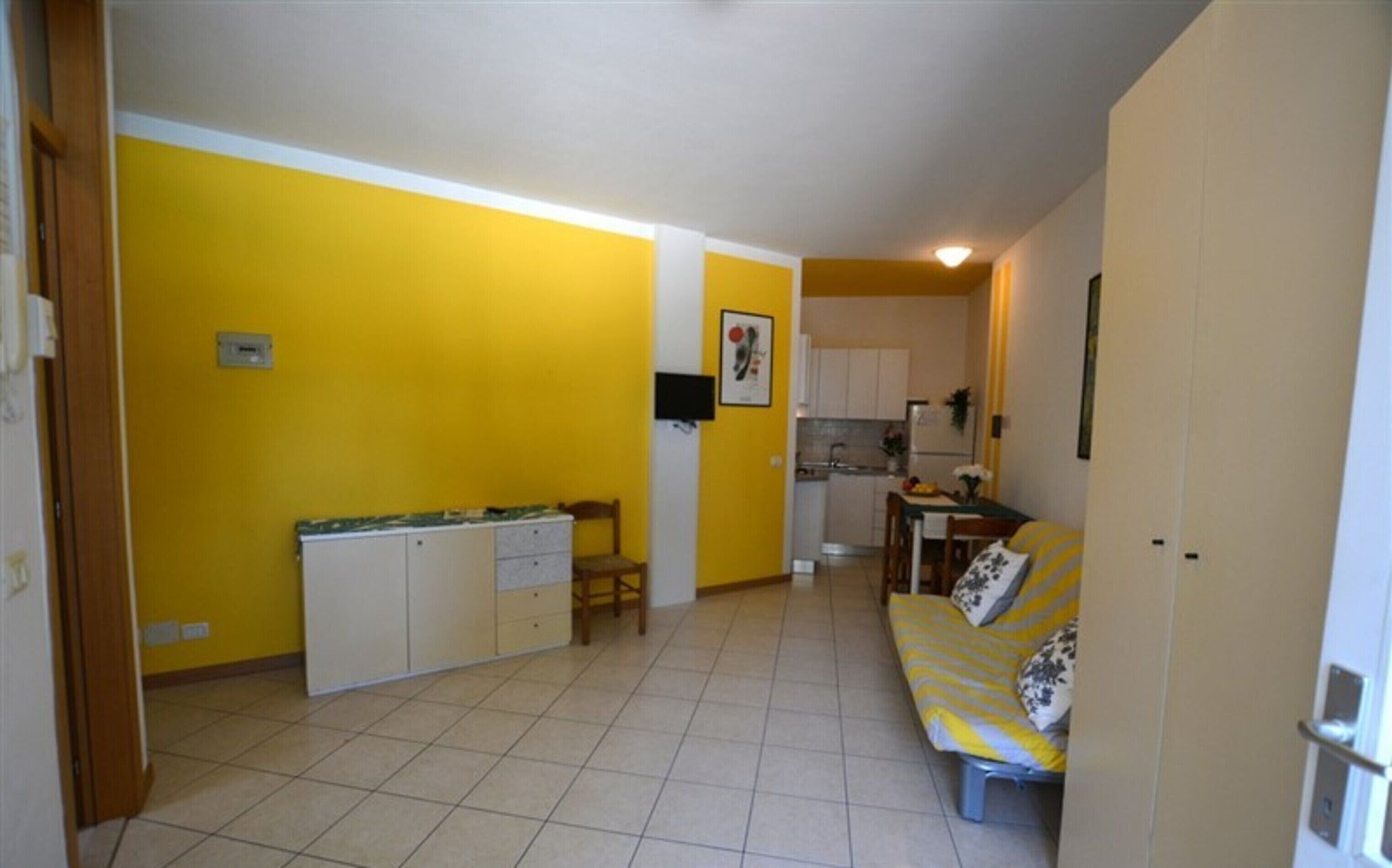 Studio, Mehrere Schlafzimmer, Balkon | Wohnbereich