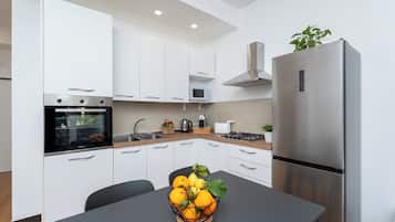 Apartment, 2 Bedrooms, Balcony | Private kitchen | Full-sized fridge, microwave, oven, stovetop