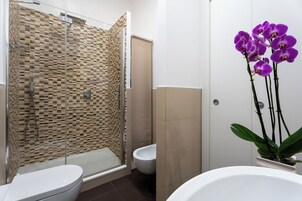 Apartment, 2 Bedrooms, Balcony | Bathroom | Shower, free toiletries, hair dryer, towels