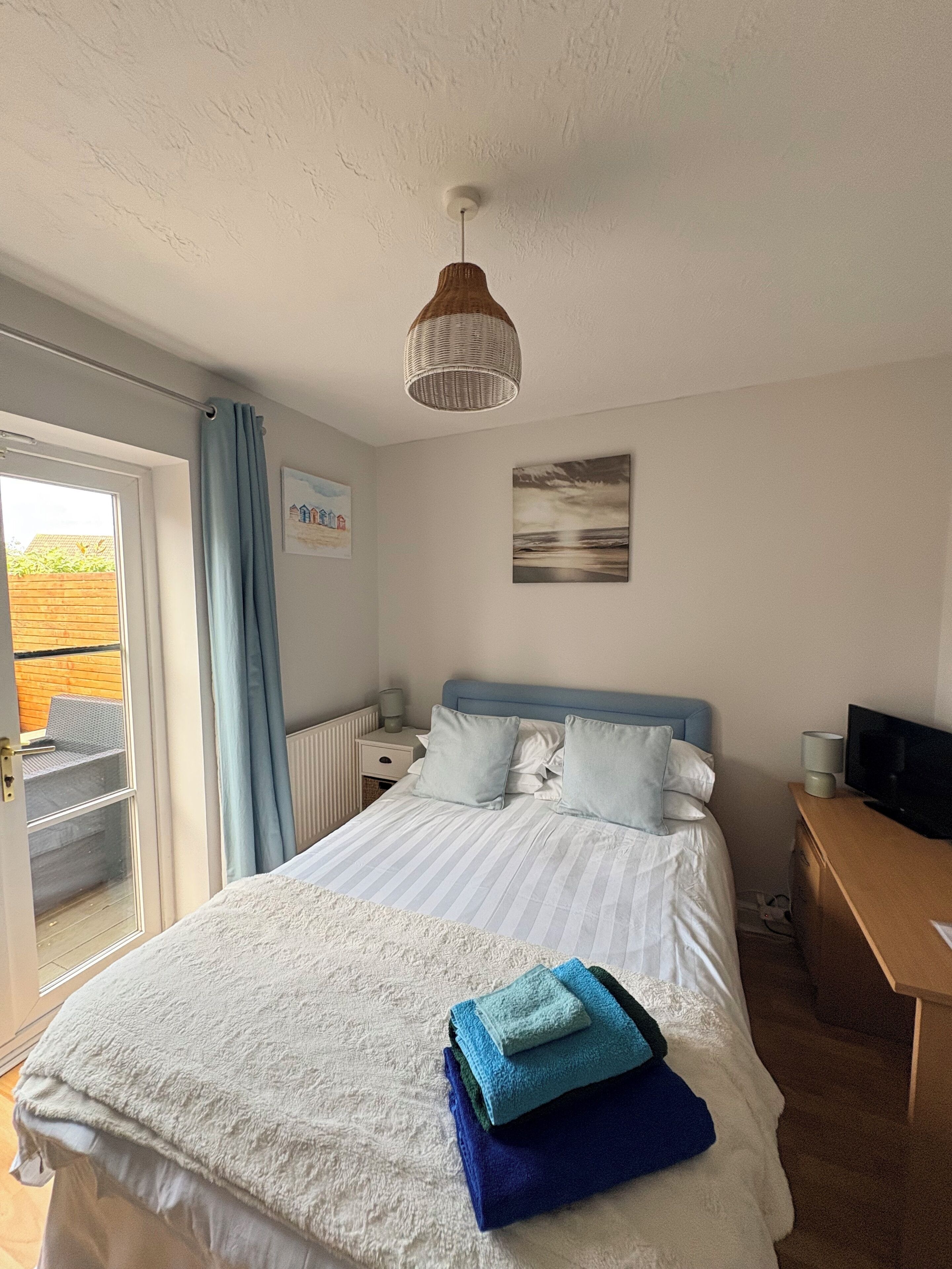 1 bedroom, desk, iron/ironing board, travel crib