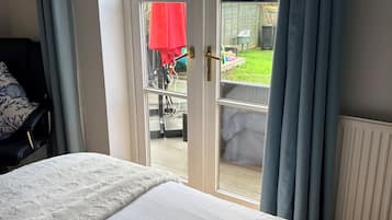 1 bedroom, desk, iron/ironing board, travel crib