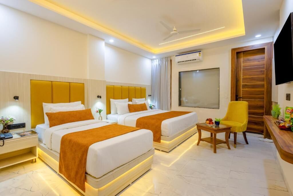 Comfort Triple Room, City View | In-room safe, desk, laptop workspace, blackout drapes