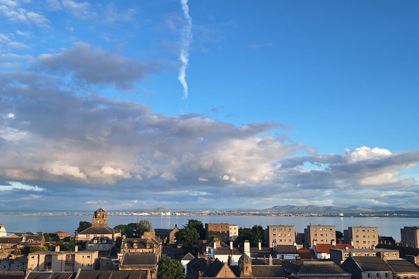 Sitting room view over the sea to Edinburgh.
