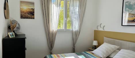 Iron/ironing board, travel crib, free WiFi, bed sheets