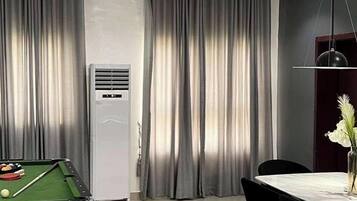 Economy Apartment, Balcony, City View | Game room