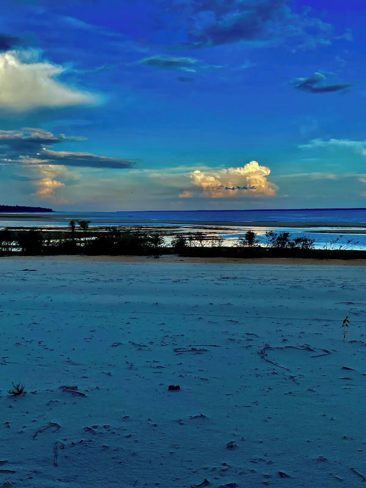 On the beach, white sand
