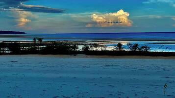 On the beach, white sand