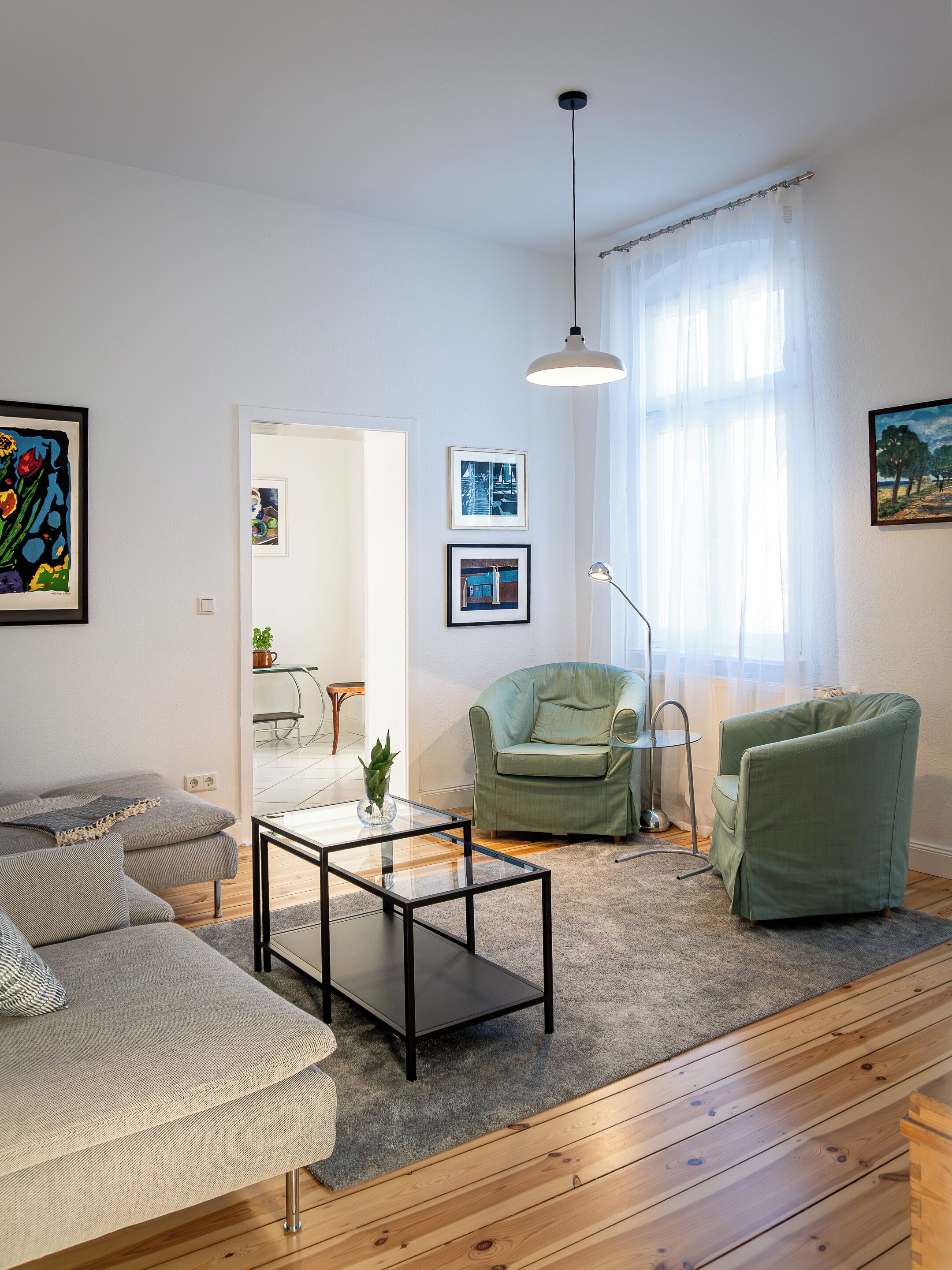 Deluxe-huoneisto, parveke, näköala puutarhaan | Oleskelualue