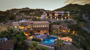 A large resort with multiple villas, a swimming pool, and a landscaped garden. - Oceanview Villa by Swimming Beach w/ Pool, Hot Tub, Firepit, Cook & Beach Club (Cabo San Lucas)