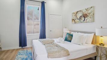 1 bedroom, laptop workspace, iron/ironing board, bed sheets