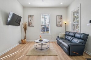 Apartment (1 Bedroom) | Living room | 50-inch TV with digital channels - Cozy Historic Gem: 5 Mins to Downtown SA (San Antonio)