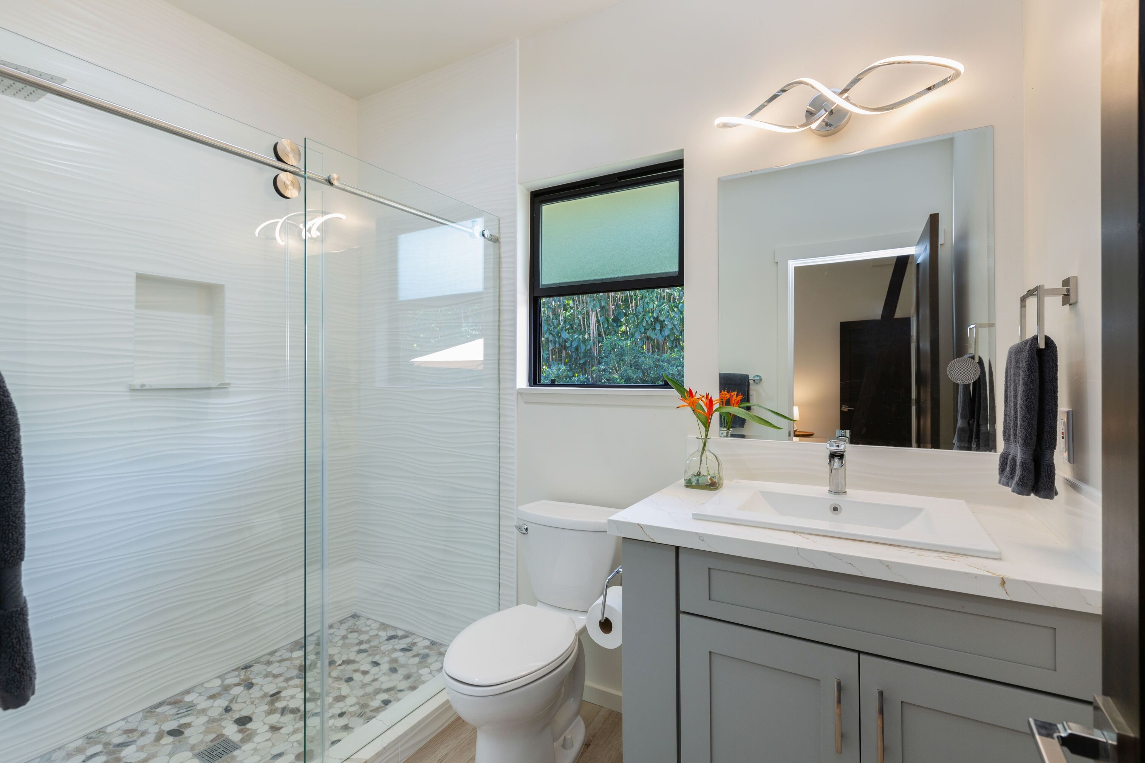 Shower, hair dryer, towels