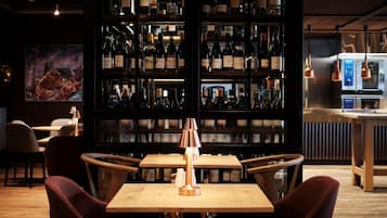 Apartment, City View | Bar (on property)