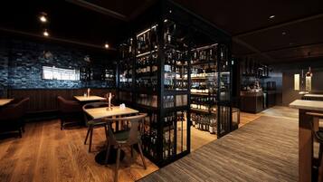 Apartment, City View | Bar (on property)