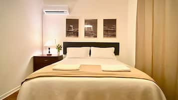 Apartamento | Espaço de trabalho para notebook, cortinas blackout