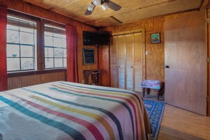 Cabin, Multiple Beds, Patio, Pool View (Cypress Creek Cabin) | 1 bedroom, individually decorated, individually furnished, bed sheets