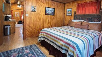 Cabin, Multiple Beds, Patio, Pool View (Cypress Creek Cabin) | 1 bedroom, individually decorated, individually furnished, bed sheets