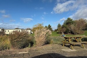 Outdoor dining - Oak Village 83 - Grange Leisure Park with Hot Tub (Mablethorpe, Lincs)