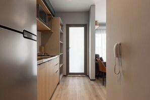 Apartamento 2 Dormitórios | Bếp riêng | Tủ lạnh, lò vi sóng, bếp nấu, dụng cụ pha espresso 
