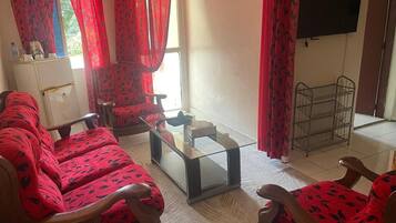 Habitación clásica | Zona de estar