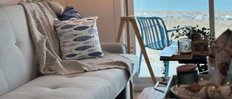 Standaard appartement, uitzicht op het strand | Woonruimte
