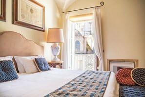 Deluxe Suite, City View | Blackout curtains, iron/ironing board, free WiFi