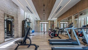 A gym with treadmills, weight machines, and exercise balls. - Waterfront escape w/ pool & BBQ grill (Cartagena de Indias)