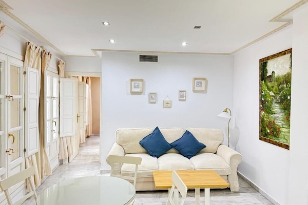 Apartment, Balcony, City View | Living area | Flat-screen TV