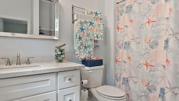 Hair dryer, towels, soap, toilet paper