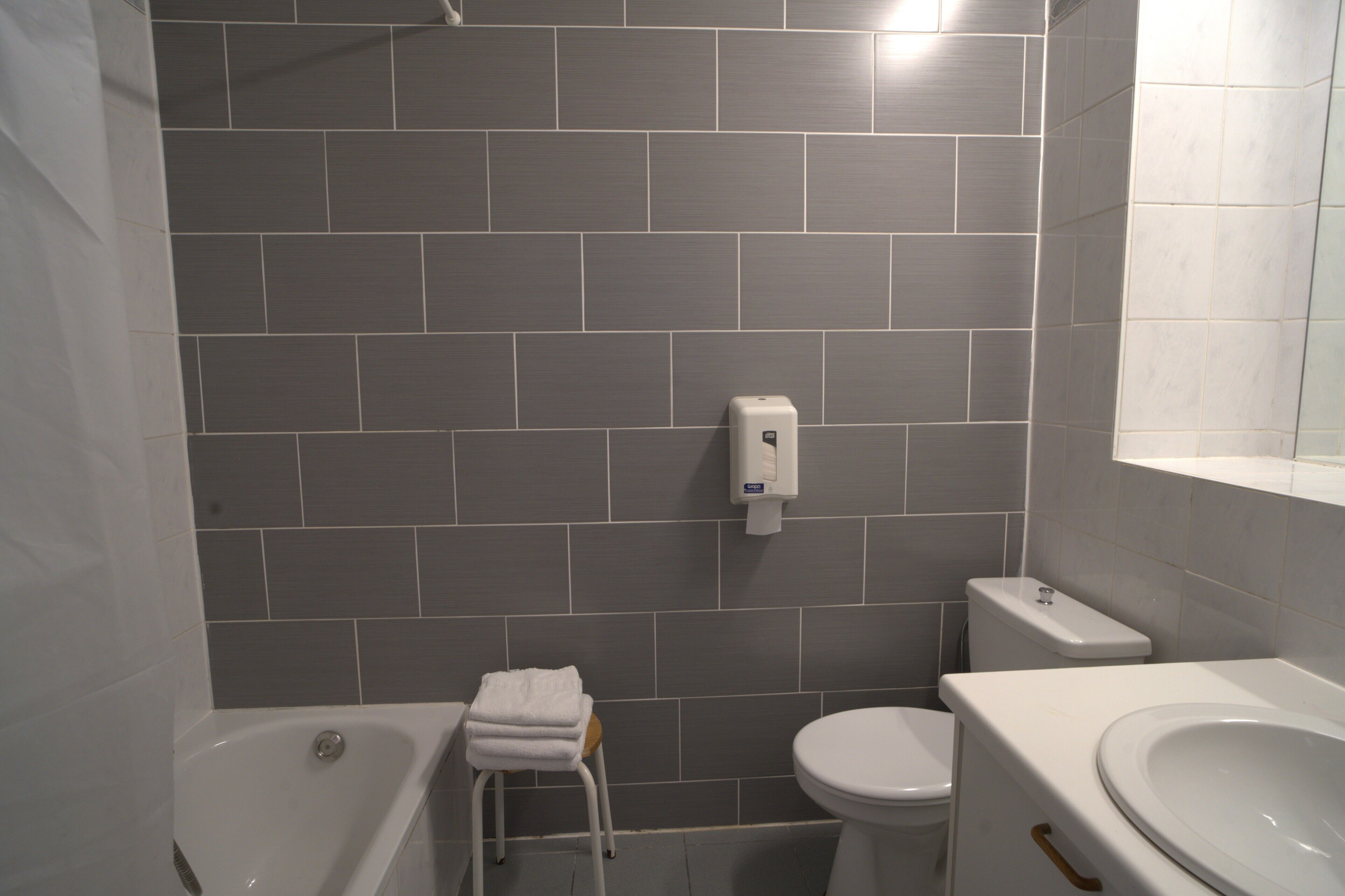 Bathtub, hair dryer (on request), towels, toilet paper