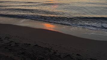 On the beach, white sand, beach volleyball, beach bar