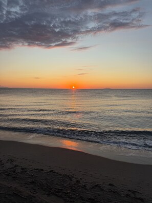 On the beach, white sand, beach volleyball, beach bar