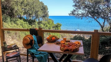 Luxury Bungalow, Sea View | Outdoor dining