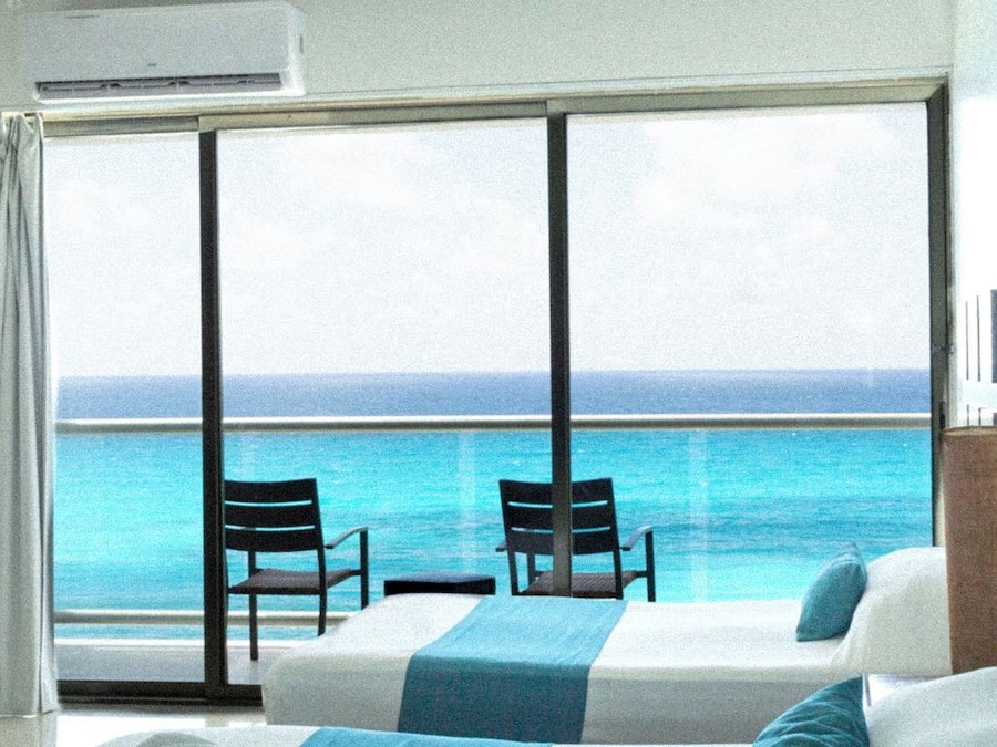 Triple Room, Balcony, Ocean View | In-room safe, blackout drapes, free WiFi