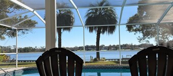 Lakefront home with heated pool minutes from Legoland