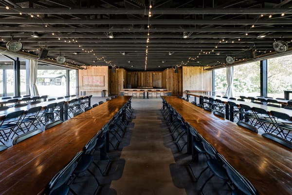 The property features an open-air pavilion with dedicated seating areas.