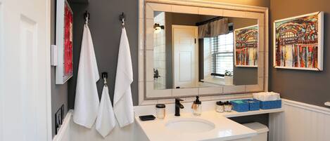 Shower, hair dryer, towels, soap