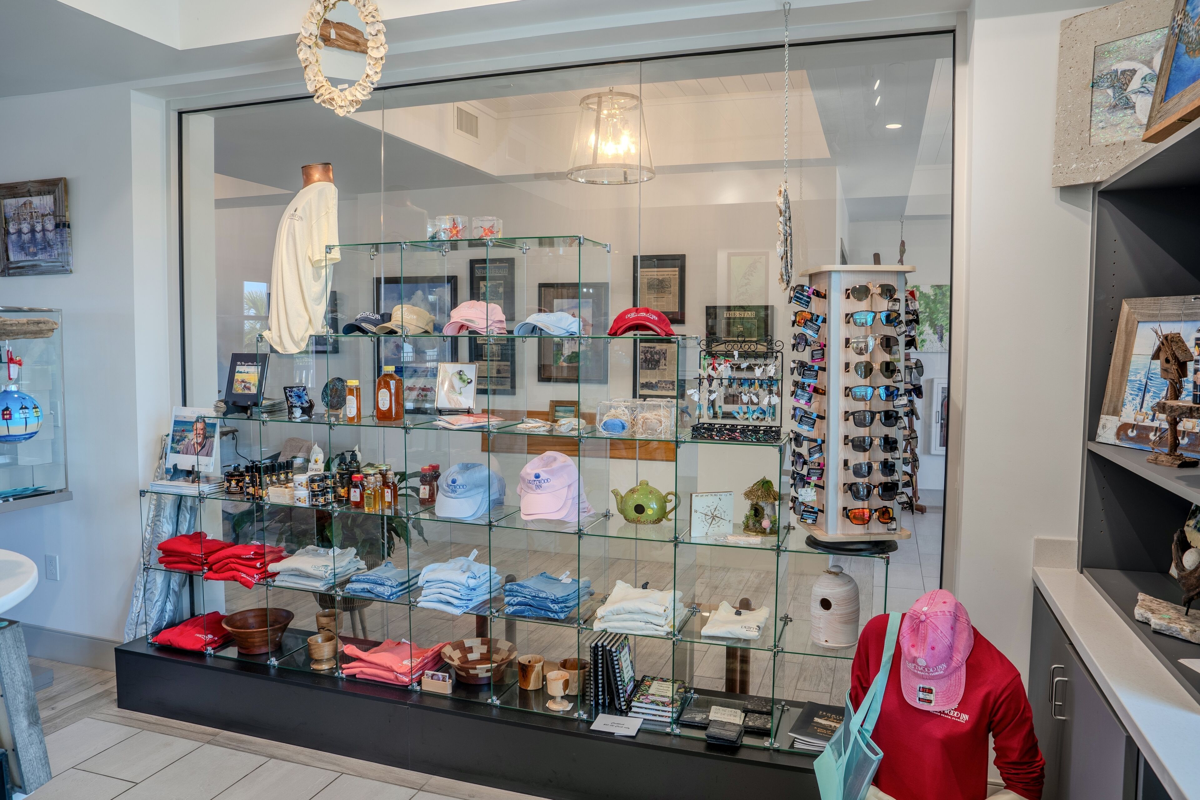 A retail space with glass display cases containing various items.