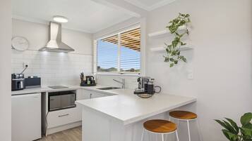 Fridge, microwave, toaster, cookware/dishes/utensils