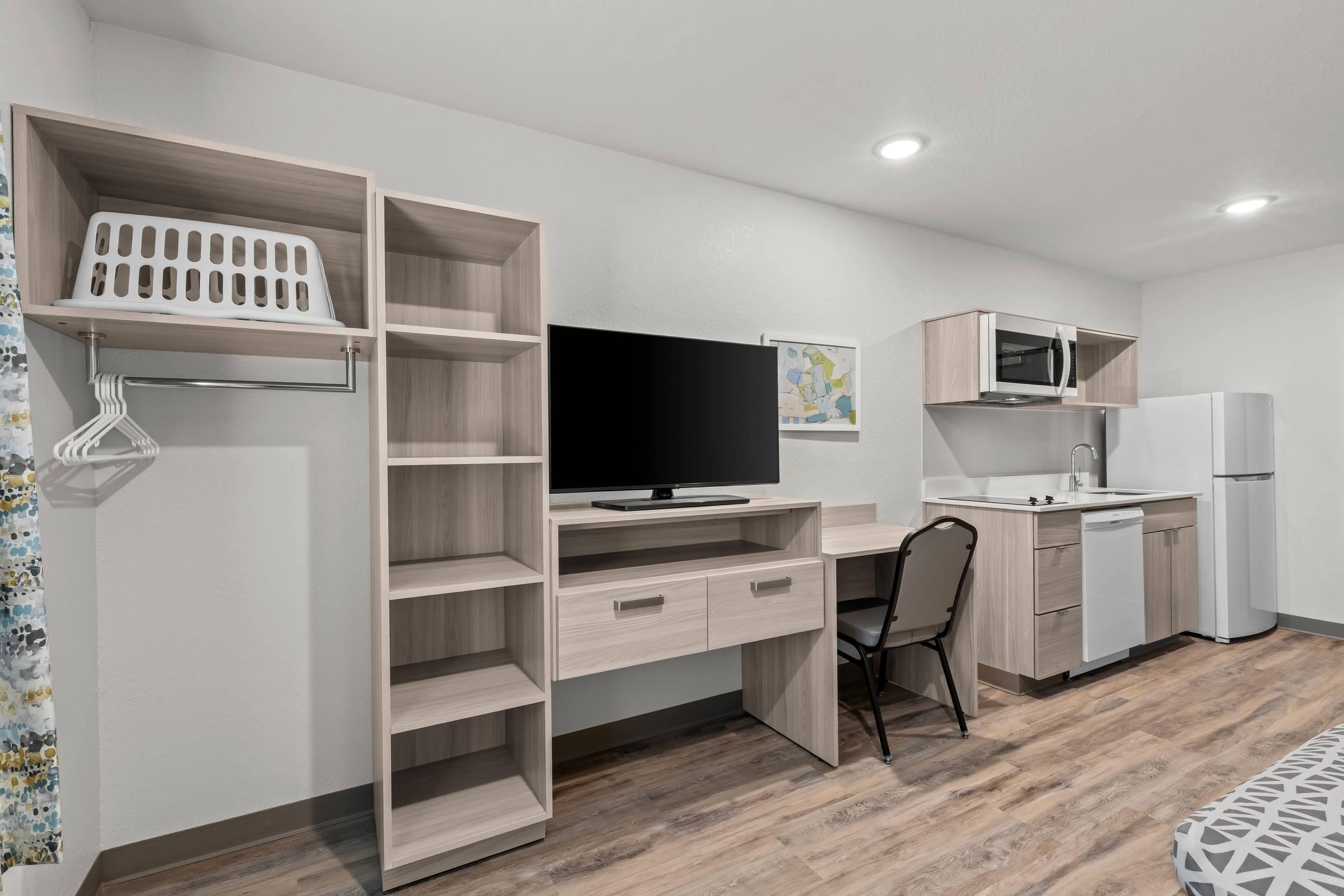 Suite, 1 Queen Bed, Non Smoking | Desk, laptop workspace, iron/ironing board, free WiFi