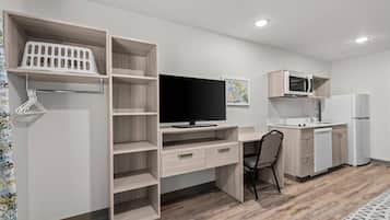 Suite, 1 Queen Bed, Non Smoking | Desk, laptop workspace, iron/ironing board, free WiFi