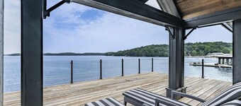 Traditional 6 bed 5 bath cottage on Lake Joseph with boathouse & pickleball!