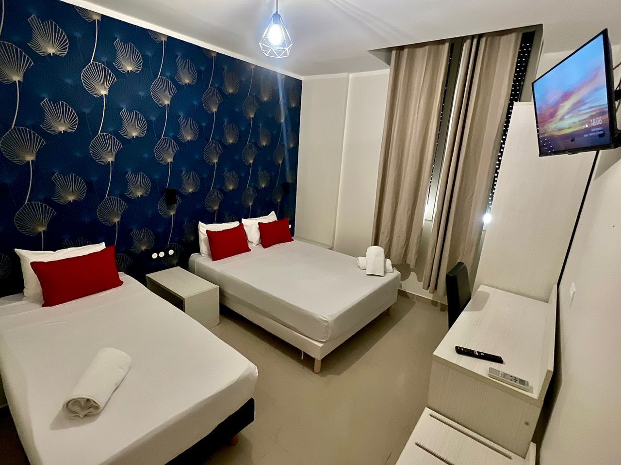 Triple Room, City View | Desk, free WiFi